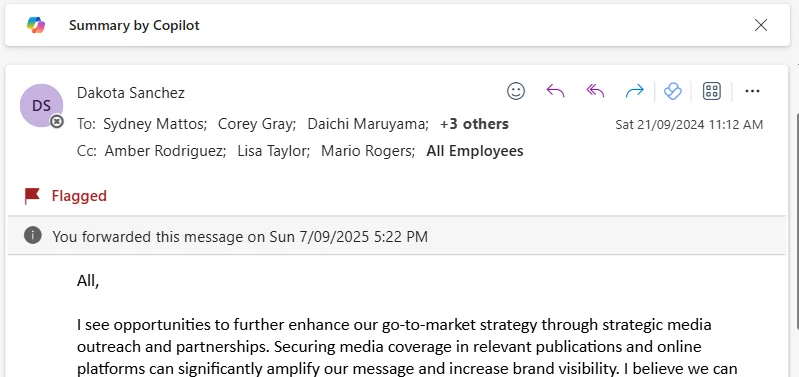 Outlook email view with a prominent 'Summary by Copilot' header bar at the top of the message — the new no-licence one-click email summary