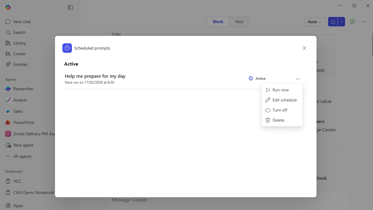 M365 Copilot 'Scheduled prompts' modal showing the new Active list with 'Help me prepare for my day' (next run 17/02/2026 at 8:30) and the new overflow menu options: Run now, Edit schedule, Turn off, Delete