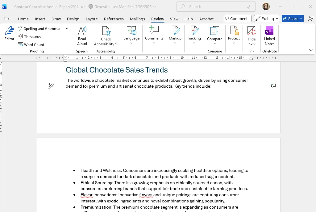 Word Review ribbon on 'Contoso Chocolate Annual Report 2024' showing the Read Aloud button alongside Editor, Spelling and Grammar, Thesaurus and Word Count — the surface where the new voice Q&A interrupt lives